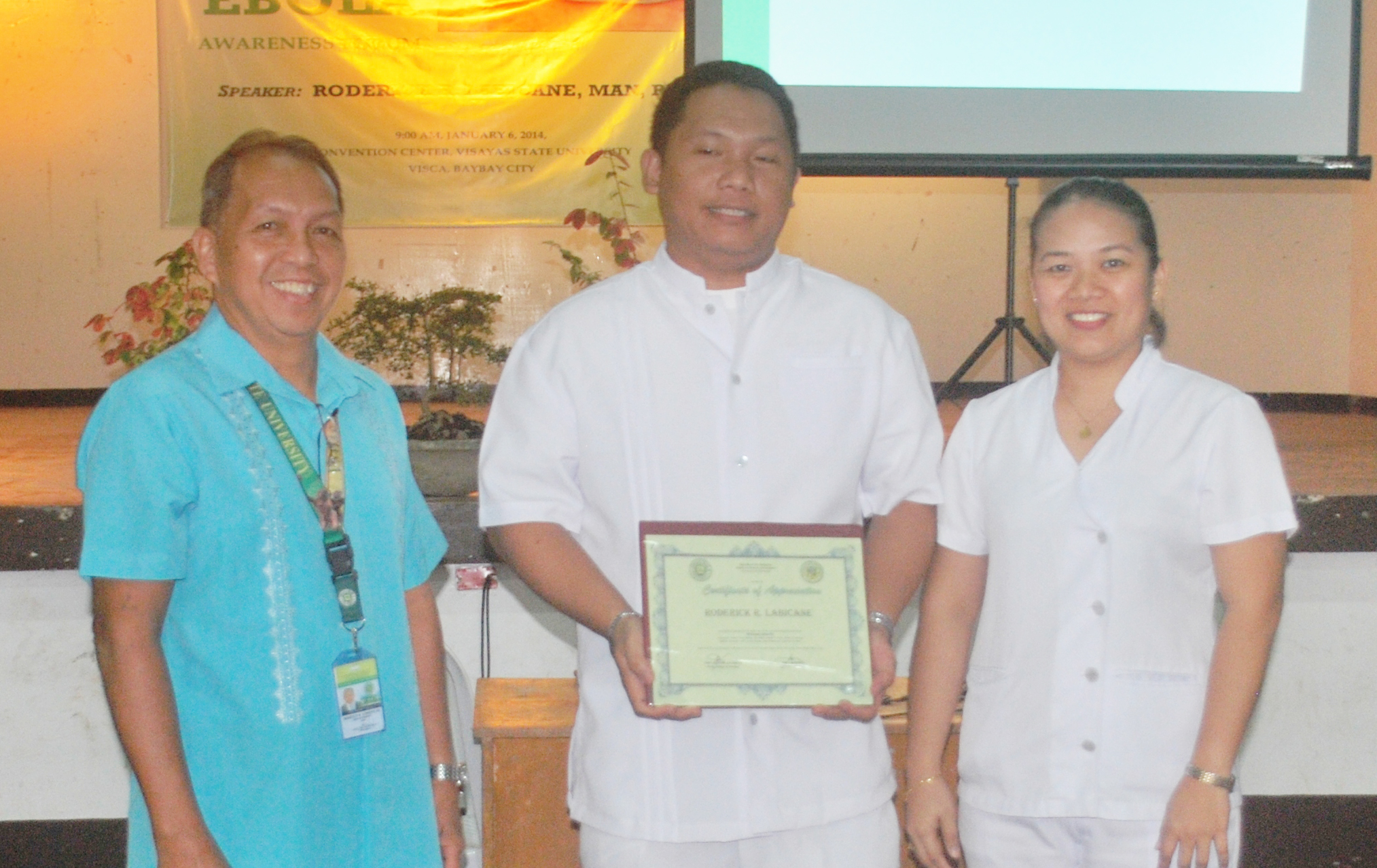 Mr. Roderick R. Labicane (center), clinical instructor, posing with Engr. Manolo B. Loreto, Jr., Dean of Students, and Ms. Janet Alexis A. Delos Santos, Dean of the College of Nursing, after the forum.